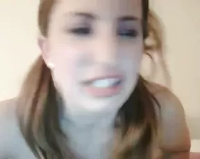 Anya is posing for the webcam