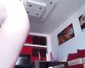 Asian chick is naked on the bed