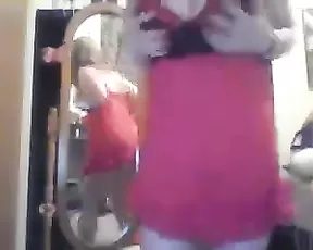 A dark haired slut is on her knees eating cock