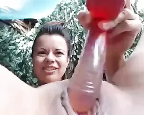 Brunette takes a vibrator to her cunt