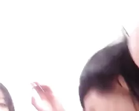 A chick in leather is masturbating