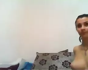 Busty beauty plays with a vibrator