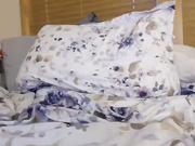 Two girls are using a strap on