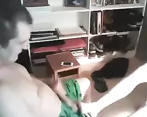 Big breasted black haired slut licks a dildo