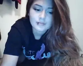 Sexy brunette in fishnet masturbates