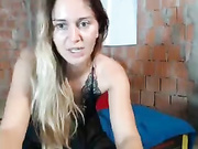 Cutie gets naked on the bed