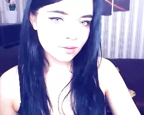 Tattooed chick plays with a dildo