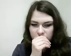 A slim teen brunette demonstrates her sucking ablilities