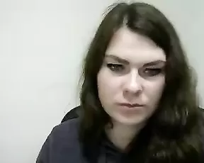 A slim teen brunette demonstrates her sucking ablilities