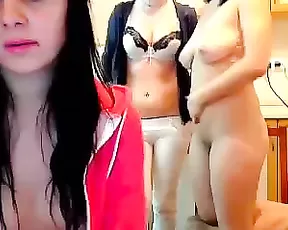 A cute brunette is getting recorded while sucking cock