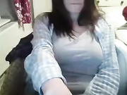 Black chick licks her tits