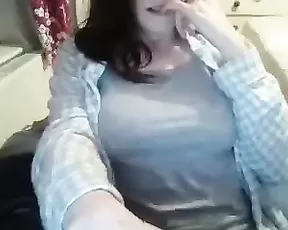 Black chick licks her tits