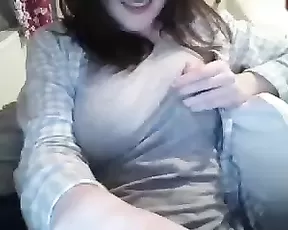 Black chick licks her tits