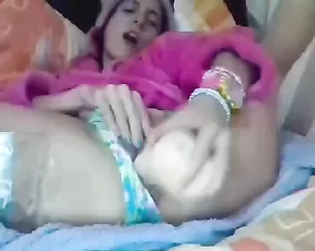 Man and a woman are naked in bed