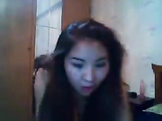 Cute looking brunette licking up a cock