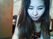 Cute looking brunette licking up a cock