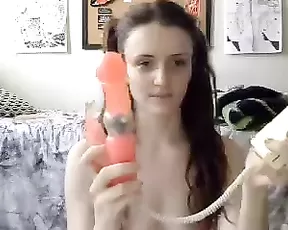 Blonde babe with puffy tits on her knees gobbling up a cock