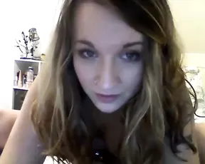 Brunette with braids gobbling up a cock