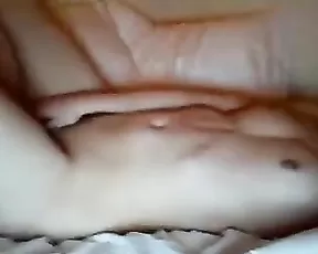Dildo is in a hairy pussy