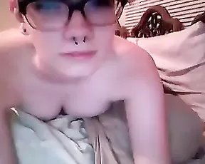 Blonde with pony tails jerking off and eating cum