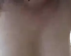 A dark haired babe with small tits on cam