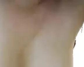 A dark haired babe with small tits on cam