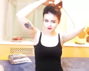 A tattooed brunette gets it hardcore