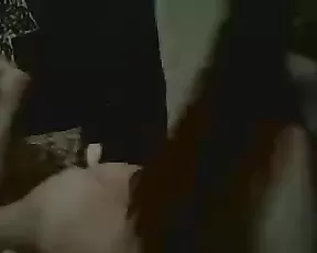 A red haired cutie getting naked