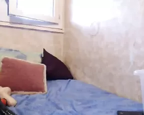 Busty brunette sits on a dildo