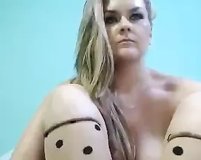 A dark haired teen keeps fingering herself