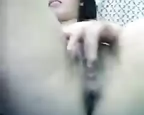 Hot woman is using a large dildo