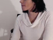 Fucking herself with a purple dildo