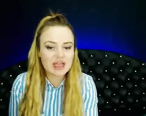 Blonde is placing a dildo inside