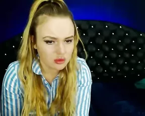 Blonde is placing a dildo inside