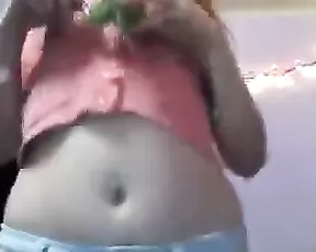 Busty woman strips naked and has fun