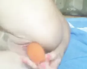A brunette is jacking off