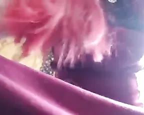 A small breasted red head is getting off on camera