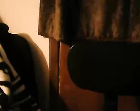 Girl is sucking a large dildo