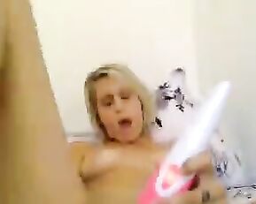 Blonde teases her wet pussy