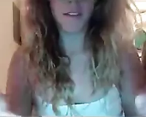 Redhead with big tits gives a blowjob
