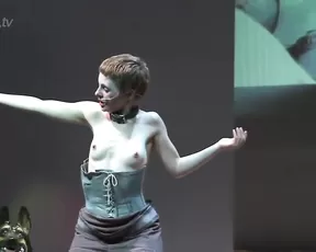 Valentina Barbarini tries to get at her nipple