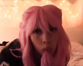 A blonde with large tits licks dick