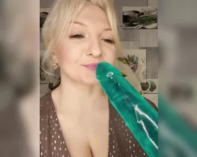 Anesteishen milf licks the head of a rubber toy