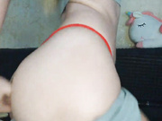 Isilib-kisa pushes aside her red panties and jerks off her pussy with toys