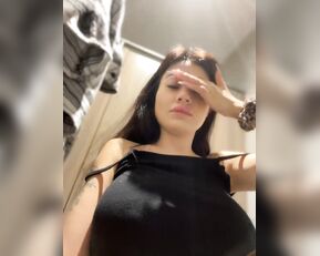 Wet__Bunny caresses pussy through panties in a fitting room in a shopping center