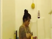 A dark haired slut and her lesbian lover get it on