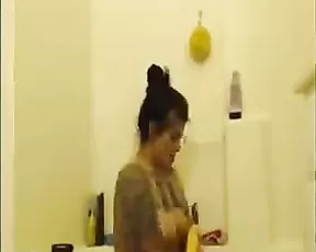 A dark haired slut and her lesbian lover get it on