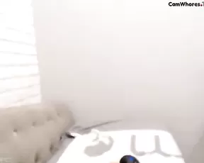 Cute brunette on her side while handling a cock