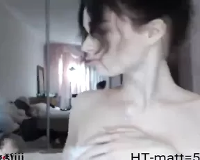 Chick in stockings spreads her legs