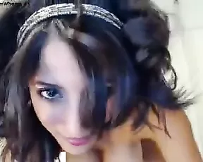 Sexy latina teen in bed teasing webcam show